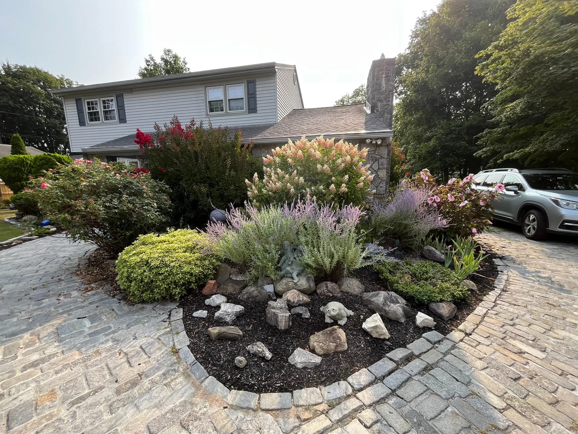Garden bed along a driveway